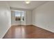 Bright bedroom with hardwood floors and bay window letting in natural light at 21455 E 44Th Ave, Denver, CO 80249