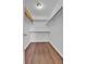 Walk-in closet with wooden floor and installed shelving at 21455 E 44Th Ave, Denver, CO 80249