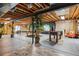 Recreational basement with tropical themed wall and a pool table and foosball table at 4293 Clover Ln, Brighton, CO 80601