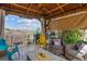 Comfortable outdoor seating underneath this gazebo with space for entertaining at 4293 Clover Ln, Brighton, CO 80601