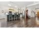 Bright open kitchen with a large island, bar seating, and modern appliances at 4293 Clover Ln, Brighton, CO 80601