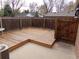 Wooden deck with a fenced yard at 1015 Alta St, Longmont, CO 80501