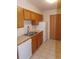 Functional kitchen features essential appliances including a dishwasher and a refrigerator at 1015 Alta St, Longmont, CO 80501