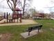 Community playground with slides, benches, covered picnic pavilion, and grassy areas at 1015 Alta St, Longmont, CO 80501