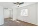 Clean bedroom features plush carpet and a mirrored closet at 3195 S Kalispell Ct, Aurora, CO 80013