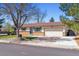 Charming ranch-style home featuring a well-maintained lawn and inviting curb appeal at 3195 S Kalispell Ct, Aurora, CO 80013