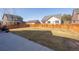 Backyard featuring a lawn, privacy fence, and concrete patio at 19603 E 63Rd Pl, Aurora, CO 80019