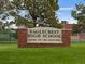 Eaglecrest High School sign, set in a brick base on a green lawn at 21833 E Quincy Pl, Aurora, CO 80015