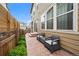 Charming backyard patio with cozy seating area and lush landscaping, creating a peaceful retreat at 21833 E Quincy Pl, Aurora, CO 80015