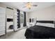 Well-lit bedroom featuring a makeup vanity, a large mirror, and a window seat at 21833 E Quincy Pl, Aurora, CO 80015