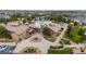 Beautifully landscaped community clubhouse with a fountain and parking, near a swimming pool at 21833 E Quincy Pl, Aurora, CO 80015