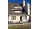 Charming home featuring neutral siding, updated windows, and a cozy outdoor seating area at 4246 S Eldridge St # 103, Morrison, CO 80465