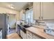 Modern kitchen featuring an undermount sink, butcher block countertops, and stainless-steel appliances at 1292 Kearney St, Denver, CO 80220
