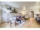 Bright living room featuring hardwood floors, stylish furniture, and elegant decor at 1292 Kearney St, Denver, CO 80220