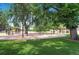 Community playground with various play structures and lush green surroundings at 1292 Kearney St, Denver, CO 80220