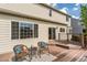 Cozy deck with outdoor seating, overlooking the landscaped backyard, perfect for relaxation at 2822 Flint Ct, Superior, CO 80027