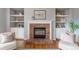 Close-up of the living room fireplace surrounded by built-in cabinets and shelves at 2822 Flint Ct, Superior, CO 80027