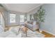 Inviting living room with neutral décor, hardwood floors, and ample natural light creating a warm atmosphere at 2822 Flint Ct, Superior, CO 80027