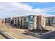 Modern apartment complex boasts varied architectural styles and well-maintained landscaping at 400 E Fremont Pl # 205, Littleton, CO 80122