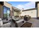 Stylish patio with fire pit, seating, grill, and outdoor dining area at 400 E Fremont Pl # 205, Littleton, CO 80122