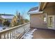Deck overlooking the backyard with blue sky background at 461 Saber Creek Dr, Monument, CO 80132