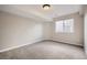 Neutral painted basement with carpet and a window providing natural light at 461 Saber Creek Dr, Monument, CO 80132