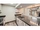 Modern kitchen features stainless steel appliances and stylish countertops at 23566 Pondview Pl # F, Golden, CO 80401