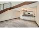 Spacious open-concept living area, combining kitchen, dining, and living spaces for modern living at 23566 Pondview Pl # F, Golden, CO 80401