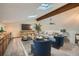 Bright living room features a ceiling beam and skylights that offer ample natural lighting at 23566 Pondview Pl # F, Golden, CO 80401