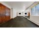 Basement gym space features rubber floor, mirrors, and plenty of room for workout equipment at 850 E Radcliff Ave, Cherry Hills Village, CO 80113