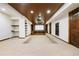 Finished basement home theater features tiered seating, projector, and built-in speakers at 850 E Radcliff Ave, Cherry Hills Village, CO 80113