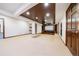 Finished basement home theater features tiered seating, projector, and built-in speakers at 850 E Radcliff Ave, Cherry Hills Village, CO 80113