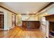 Entertainer's dream with a large wet bar, hardwood floors, and convenient access to other rooms at 850 E Radcliff Ave, Cherry Hills Village, CO 80113