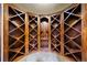 Custom wine cellar featuring beautiful wood racking for ample storage and display of your collection at 850 E Radcliff Ave, Cherry Hills Village, CO 80113