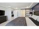 This is a main bedroom that leads to the ensuite and adjacent living space at 10207 Xanadu St, Commerce City, CO 80022