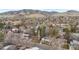 Aerial view of a neighborhood nestled against the backdrop of majestic mountains at 3545 Cloverleaf Dr, Boulder, CO 80304