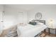 Modern bedroom showcasing a queen bed, elegant decor, and closet at 3545 Cloverleaf Dr, Boulder, CO 80304