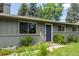 Close-up of the exterior entrance with well-manicured landscaping at 3545 Cloverleaf Dr, Boulder, CO 80304