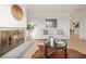 Open living space with a fireplace, comfortable seating, and modern decor at 3545 Cloverleaf Dr, Boulder, CO 80304