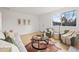 Inviting living room with ample natural light and a comfortable seating area at 3545 Cloverleaf Dr, Boulder, CO 80304