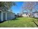 Backyard featuring a deck, shed and mature trees, great for relaxation at 4920 Clay St, Denver, CO 80221