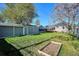 Spacious backyard featuring a large shed, garden bed and deck off the house at 4920 Clay St, Denver, CO 80221