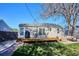 Backyard deck with outdoor seating and grill, ideal for entertaining and relaxing at 4920 Clay St, Denver, CO 80221