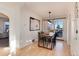Dining area with dark wood furniture, modern lighting, and sliding glass doors at 4920 Clay St, Denver, CO 80221