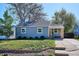 Charming home featuring a well-maintained lawn and a freshly painted exterior in a desirable neighborhood at 4920 Clay St, Denver, CO 80221