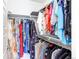 Organized closet featuring double racks, allowing for maximum clothing storage at 8361 Parkland St, Broomfield, CO 80021