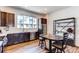 Stylish kitchen featuring stainless steel appliances and a dining area at 8361 Parkland St, Broomfield, CO 80021