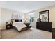 Comfortable bedroom with natural light and a neutral color scheme at 3343 S Monaco Pkwy # A, Denver, CO 80222