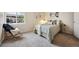 Inviting bedroom with soft carpet, natural light, and stylish furniture at 3343 S Monaco Pkwy # A, Denver, CO 80222