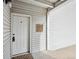 Front door to multi-unit townhome at 3343 S Monaco Pkwy # A, Denver, CO 80222